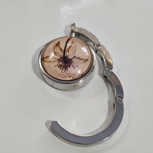 Silver and Cream Brooches with Elegant Design